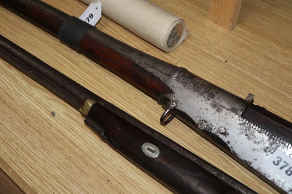 A 19th century percussion cap musket and an Eastern musket